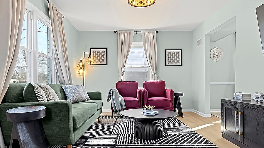 Living room at Alpha Luxury Homes
